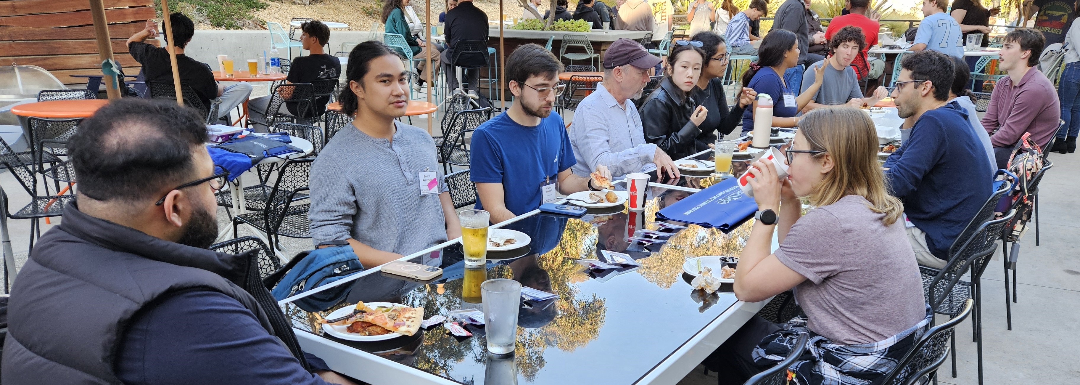 graduates eating at table